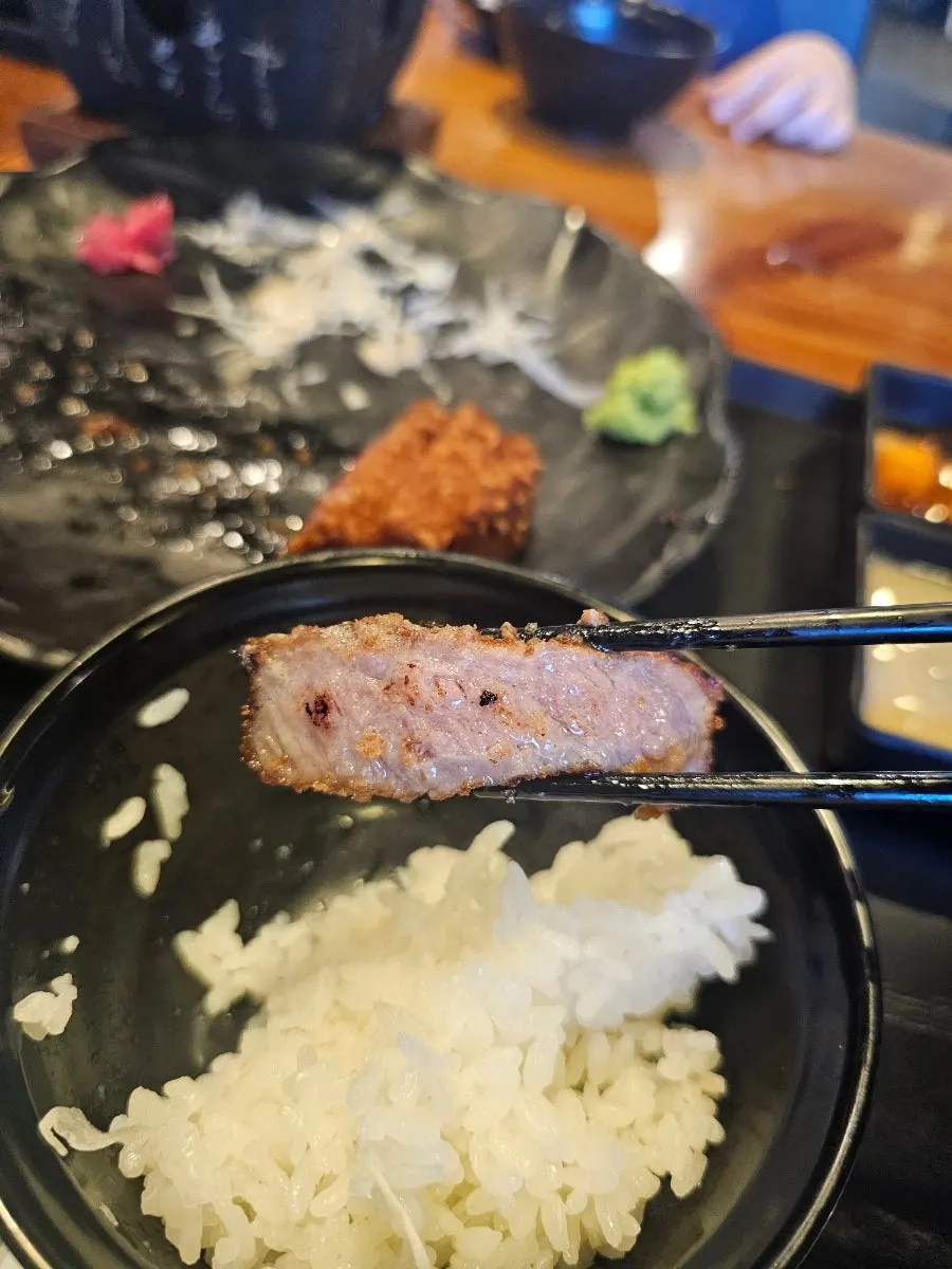 이자와 여의도직영점 입구 간판