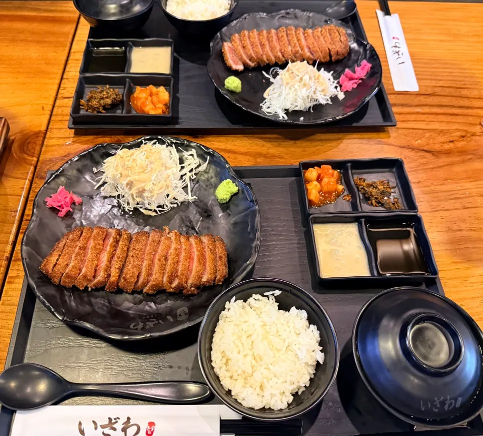 Full table spread of the gyukatsu 2-person set with drink included