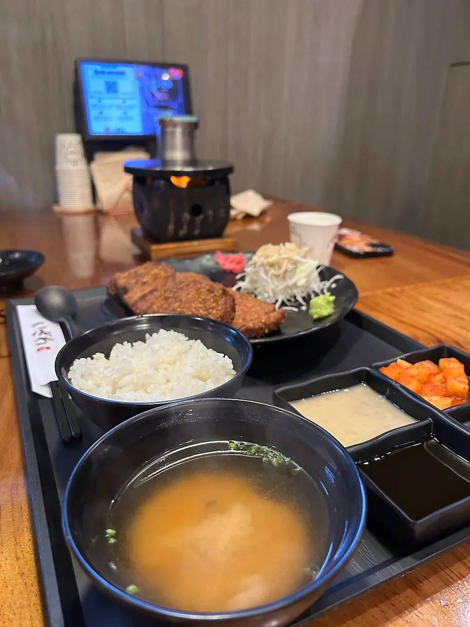Two sauces — soy sauce base and a nutty sauce