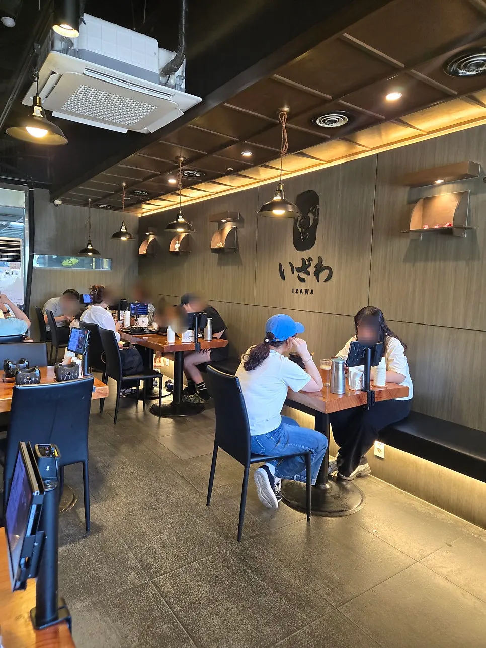 Izawa's dining room nearly full during lunch hour