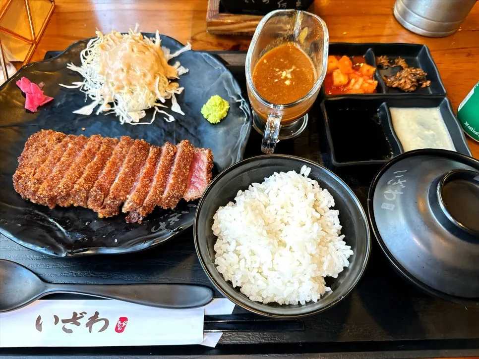 Gyukatsu set served with rice, miso soup, and cabbage salad
