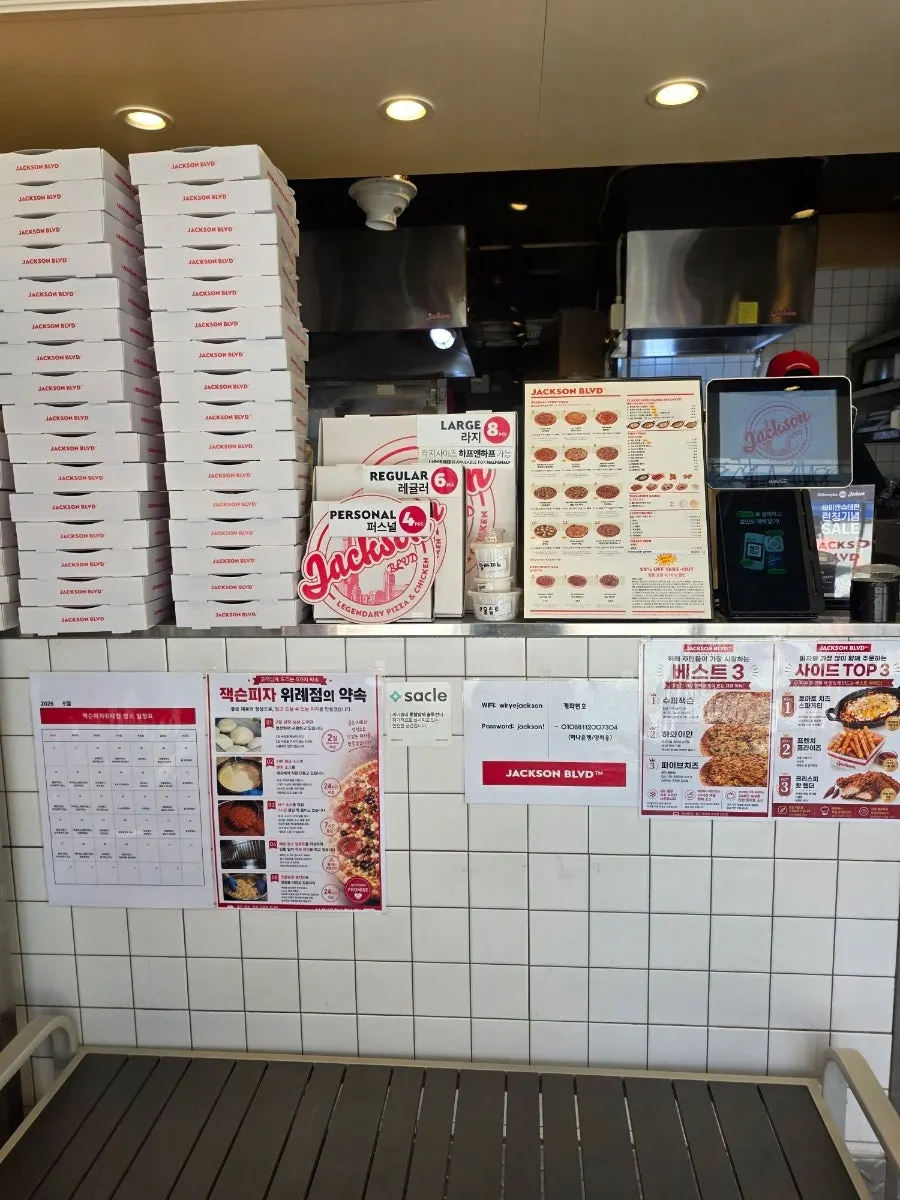 Neatly organized counter, kitchen, and waiting seats
