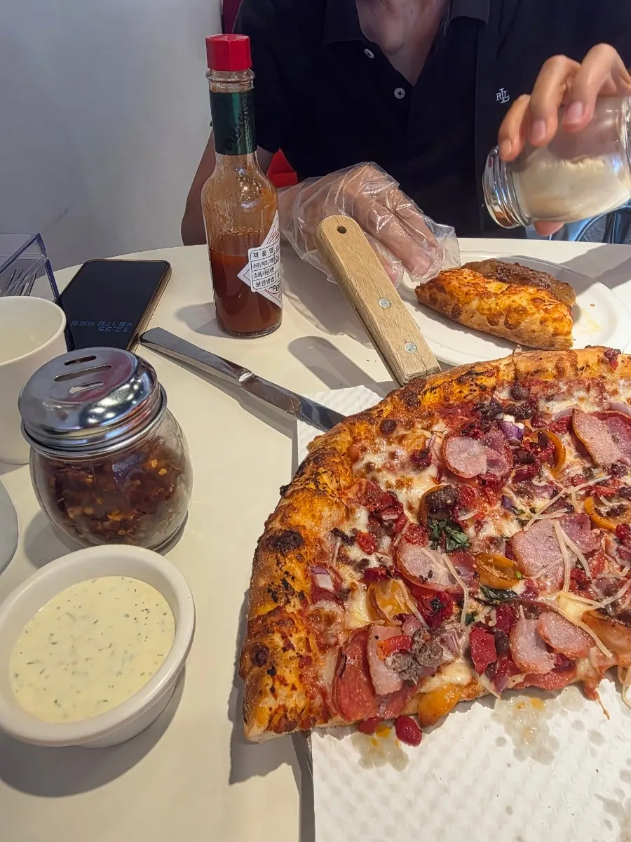 Dipping the crust into ranch sauce