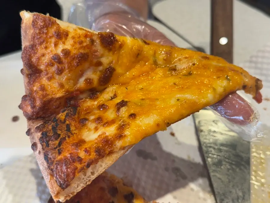 Five Cheese pizza topped with five kinds of cheese
