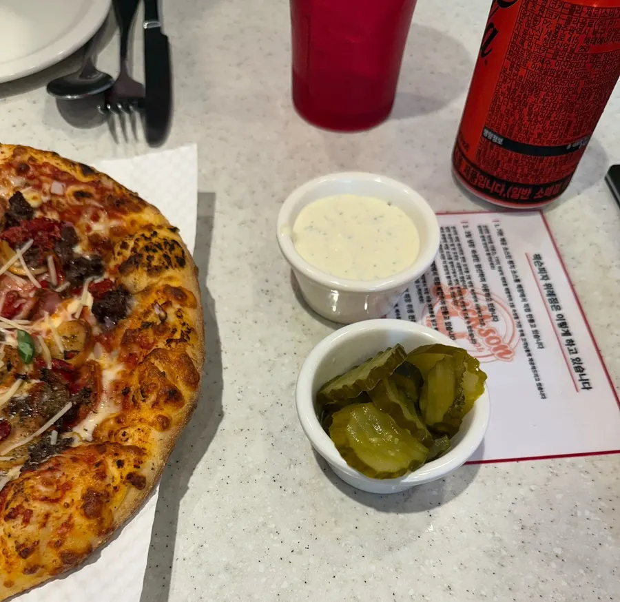 Super Jackson Regular pizza loaded with toppings