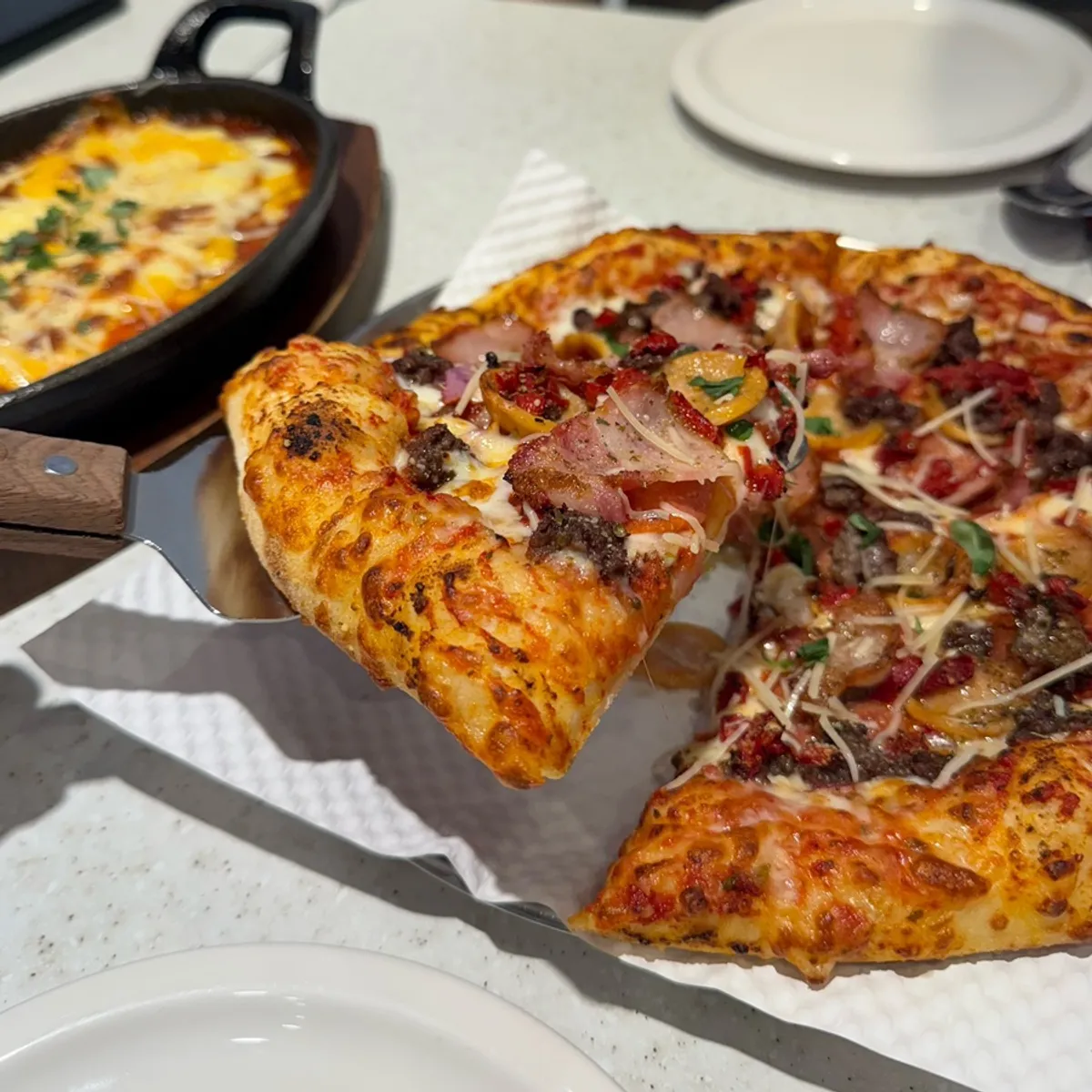 Puffed-up crust of the Super Jackson pizza