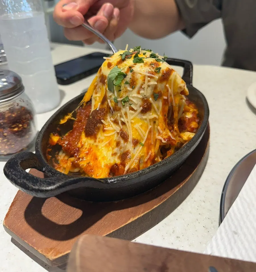 A generous plate of tomato cheese oven spaghetti