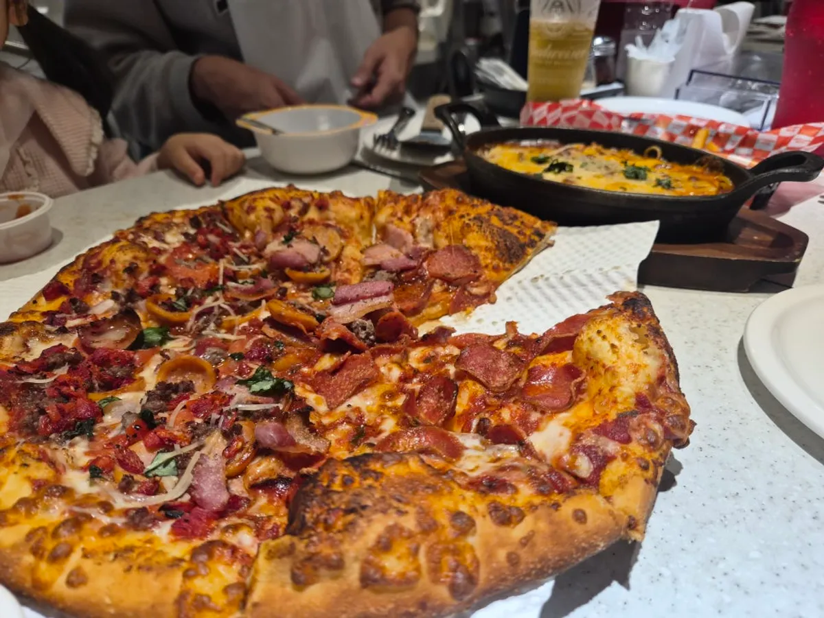 Main photo from the visit to Jackson Pizza Wirye Branch