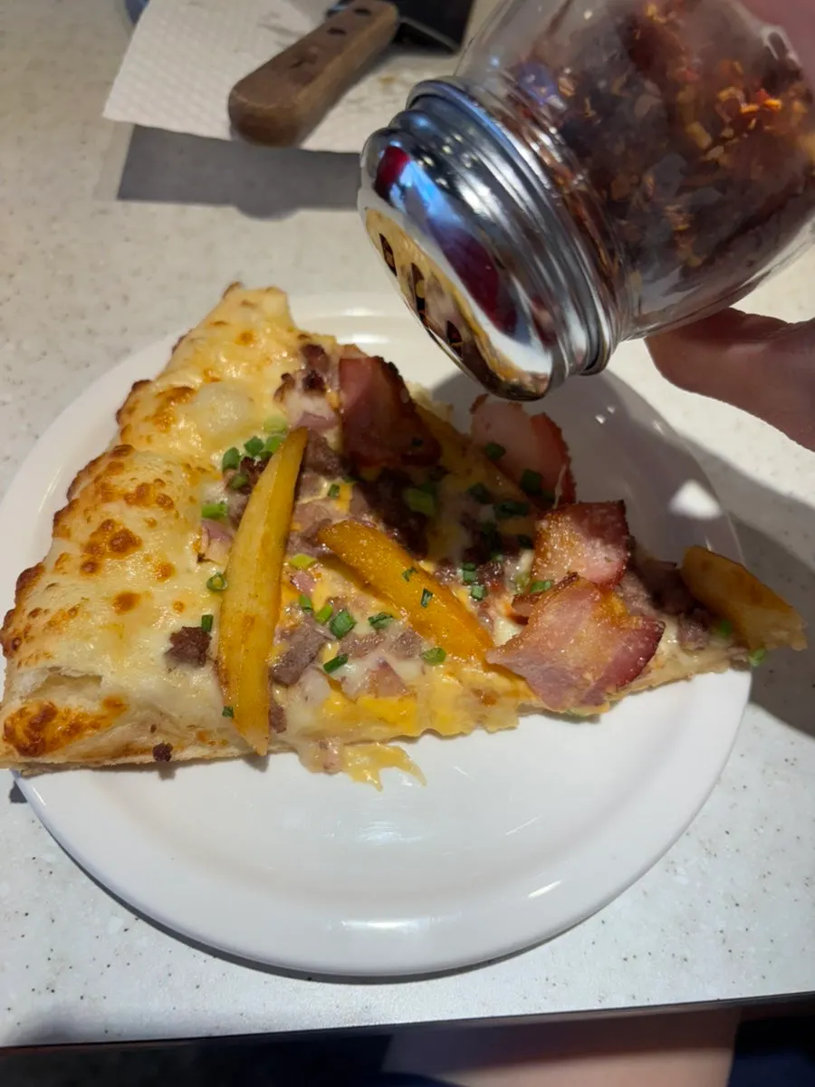 Refilled ranch sauce and pickles with remaining pizza slices