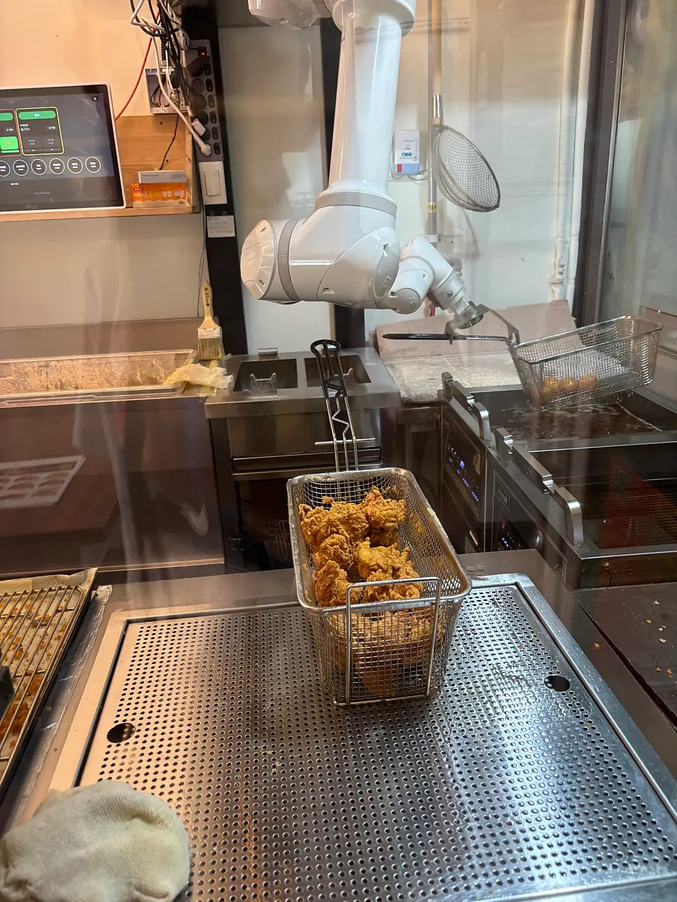 Freshly fried chicken just out of the fryer