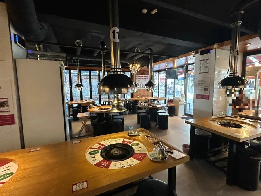 Restaurant interior with 4-person tables