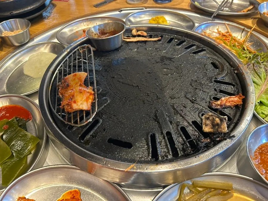 The grill and table after the meal
