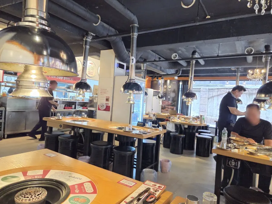 Dining hall with large windows at Jjaengbanjip8292 Sinchon