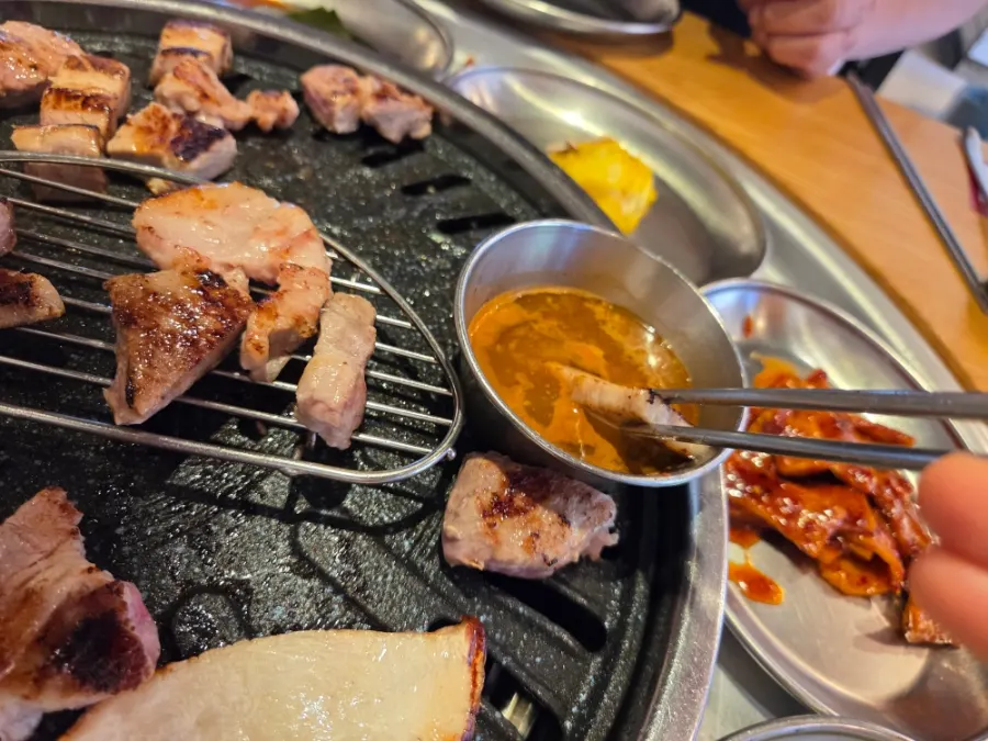 A piece of pork jowl dipped in myeoljeot
