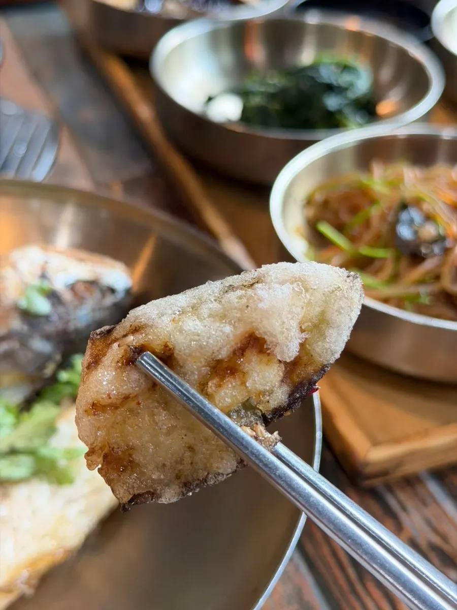 Pot with rice and sungnyung set aside for nurungji