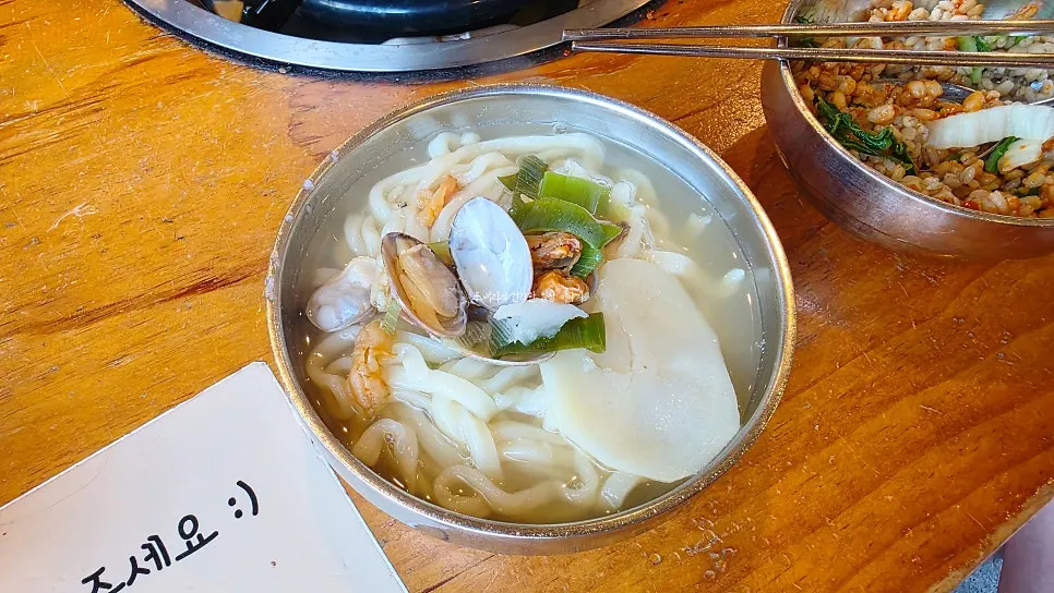 Kalguksu broth with clams and wrinkled sea squirt