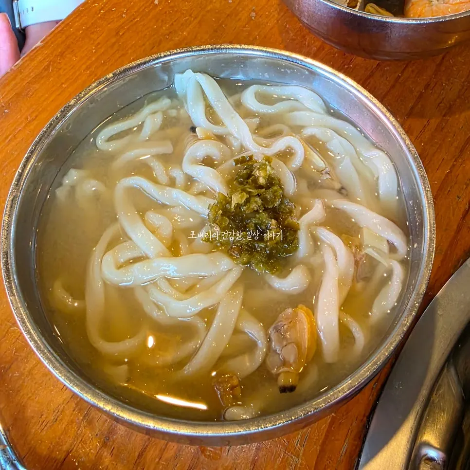 A bowl of kalguksu made spicy with chili paste