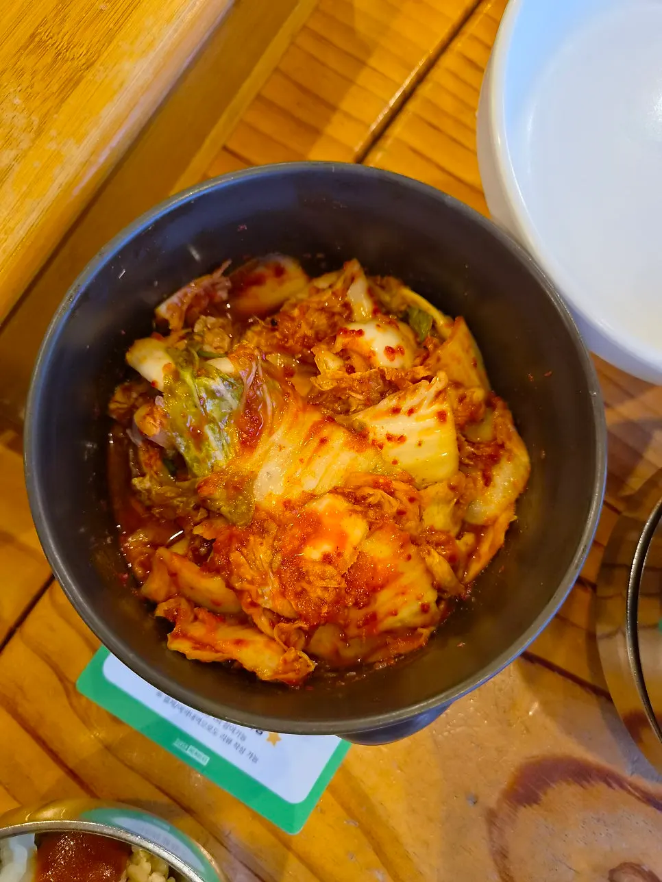 A plate of kimchi served alongside the kalguksu