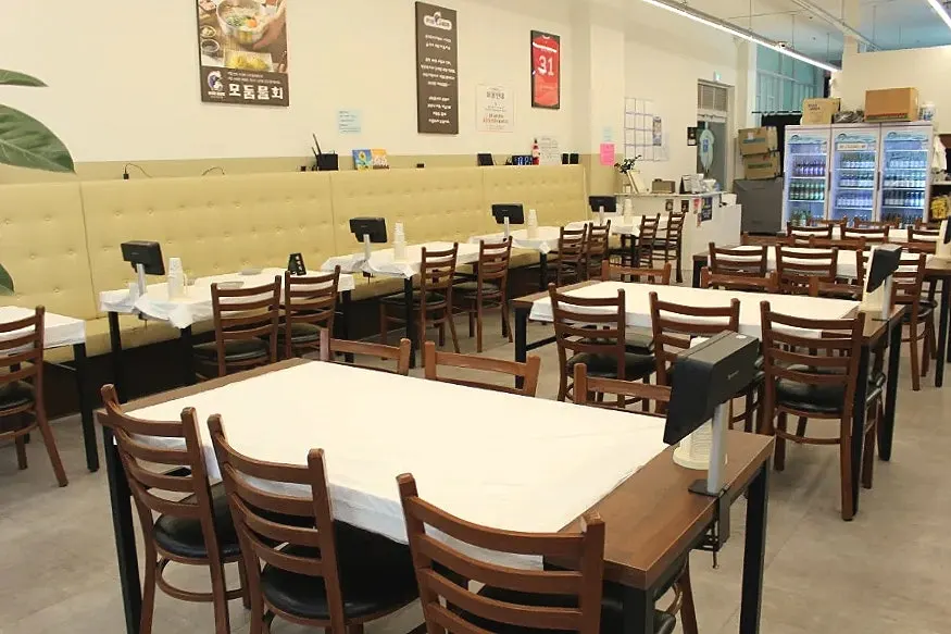 Interior of the spacious dining hall with many tables