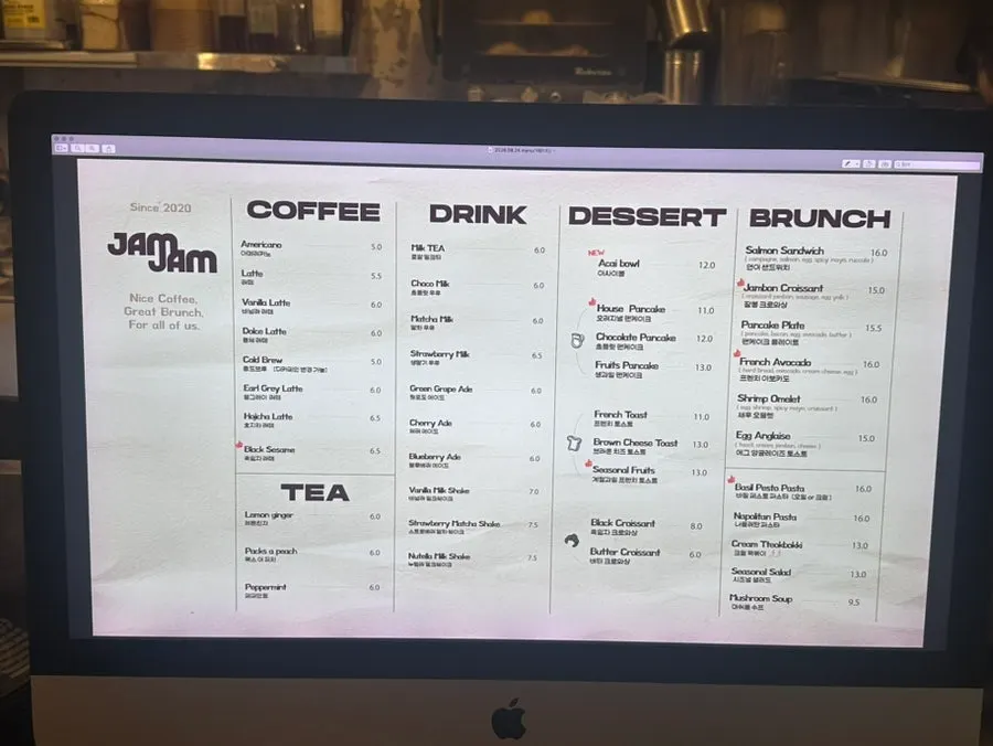 Jam Jam's menu board listing coffee and desserts