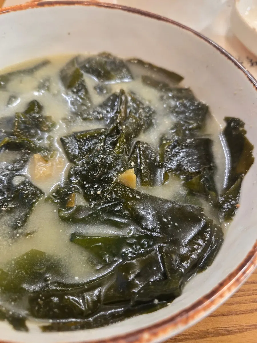 Seaweed soup served with the meal