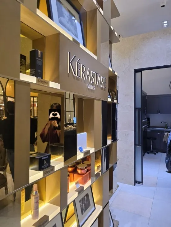 Interior of the salon divided into designer-assigned spaces