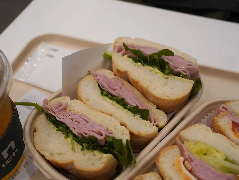 Inside of the truffle jambon-beurre packed with toppings