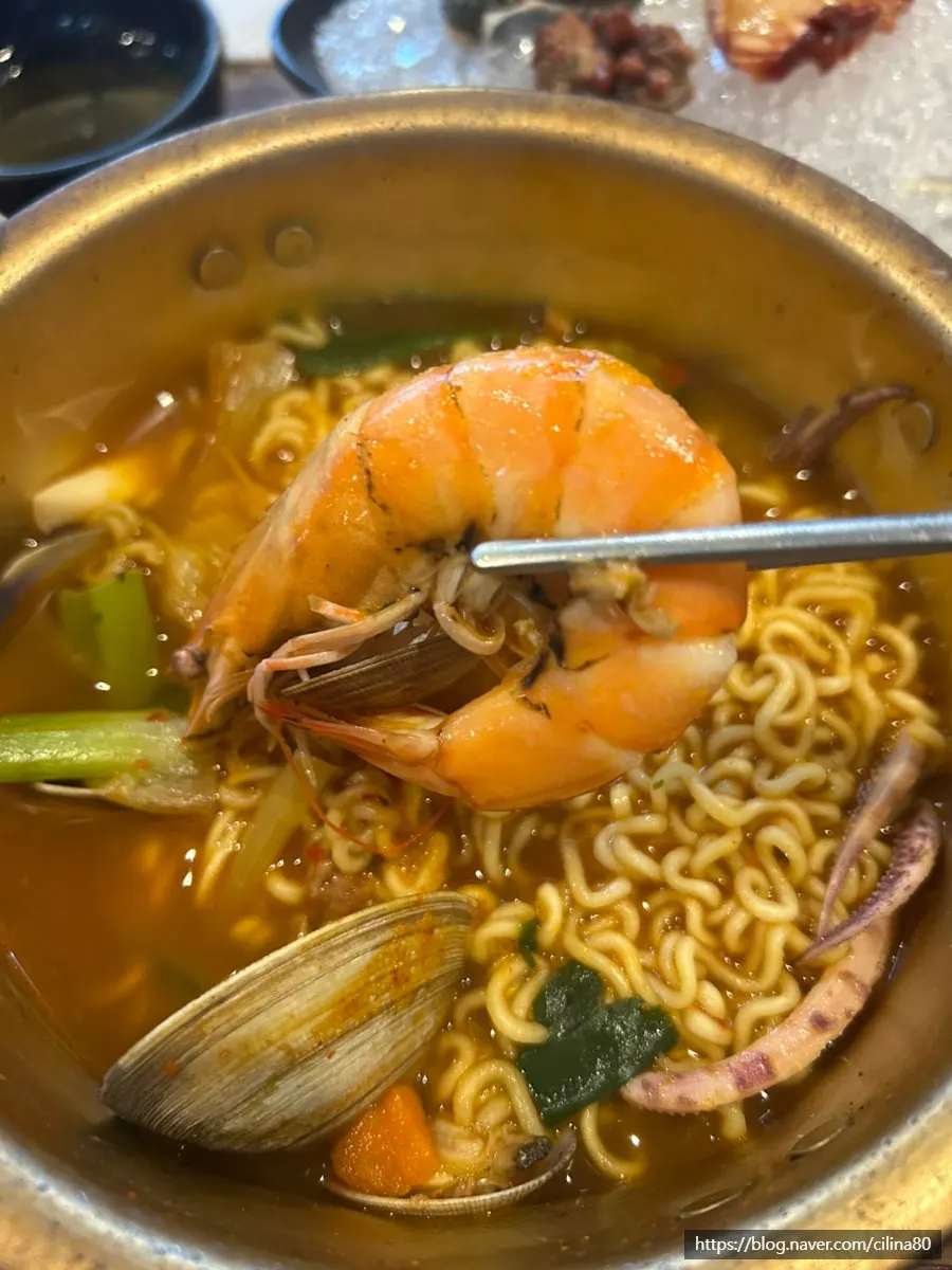 Spicy seafood ramyeon broth and noodles