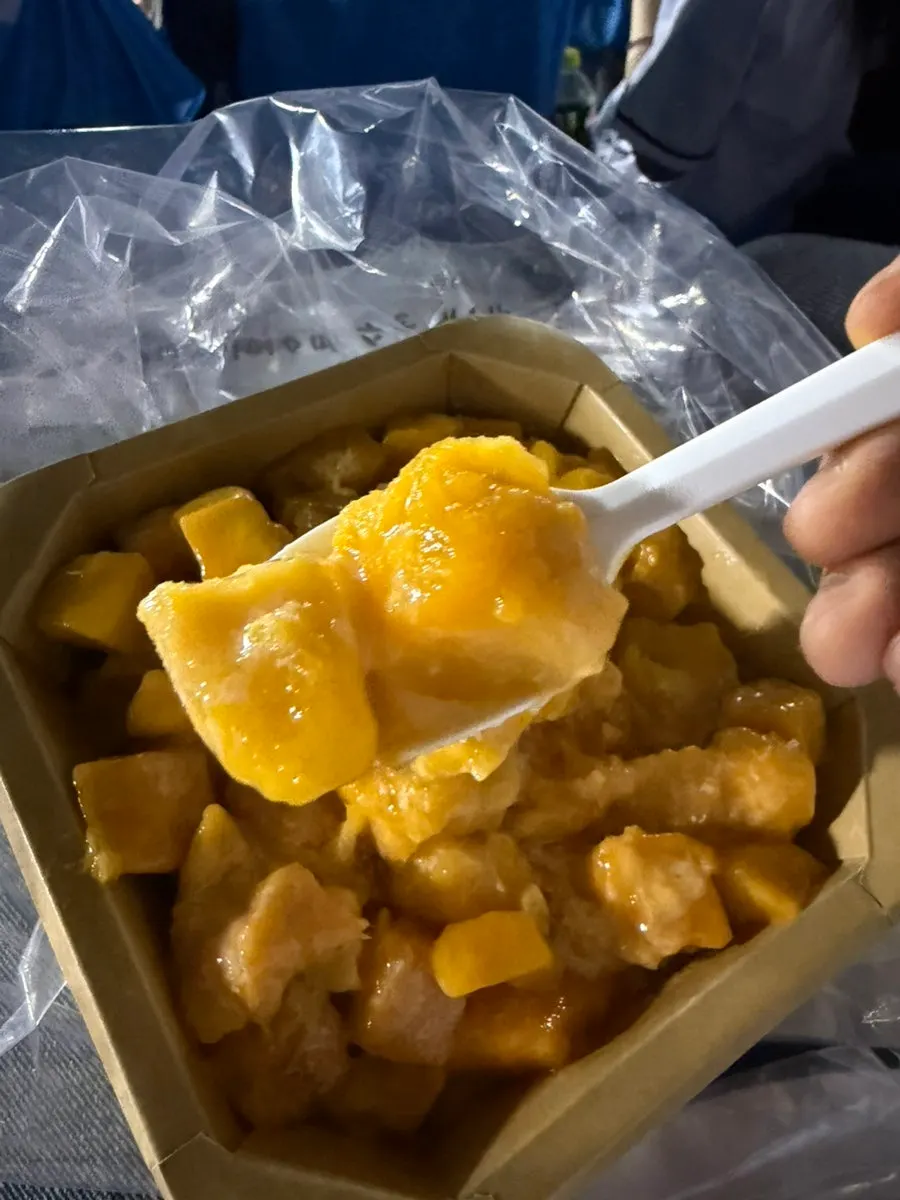 Mango bingsu with milk ice and mango syrup