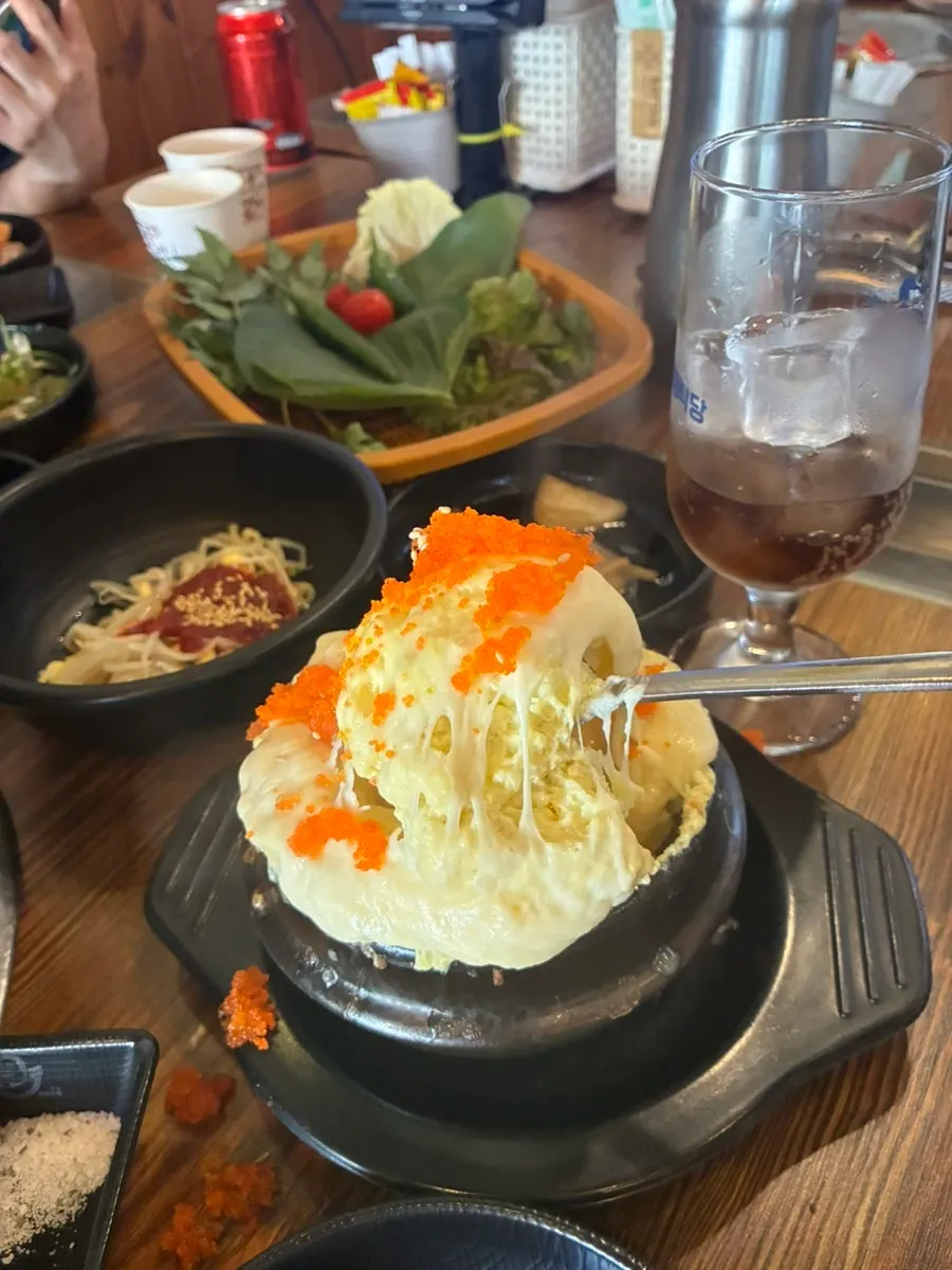 Table with meat and side dishes laid out together