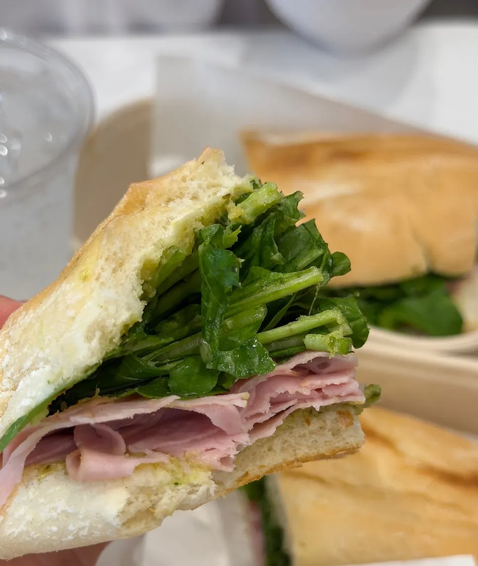 Basil jambon-beurre with fresh arugula