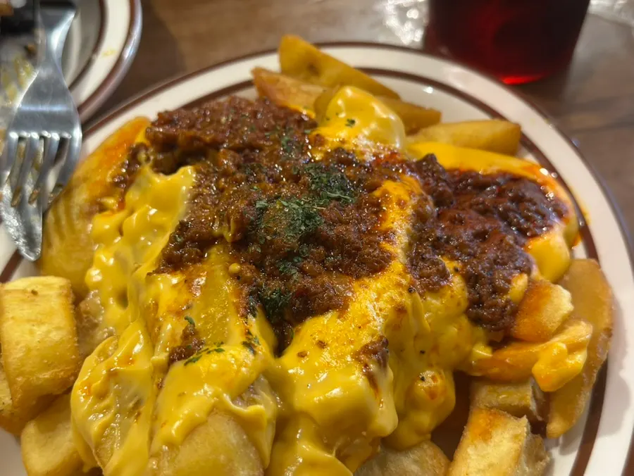 Chili cheese fries with beef chili and cheese sauce