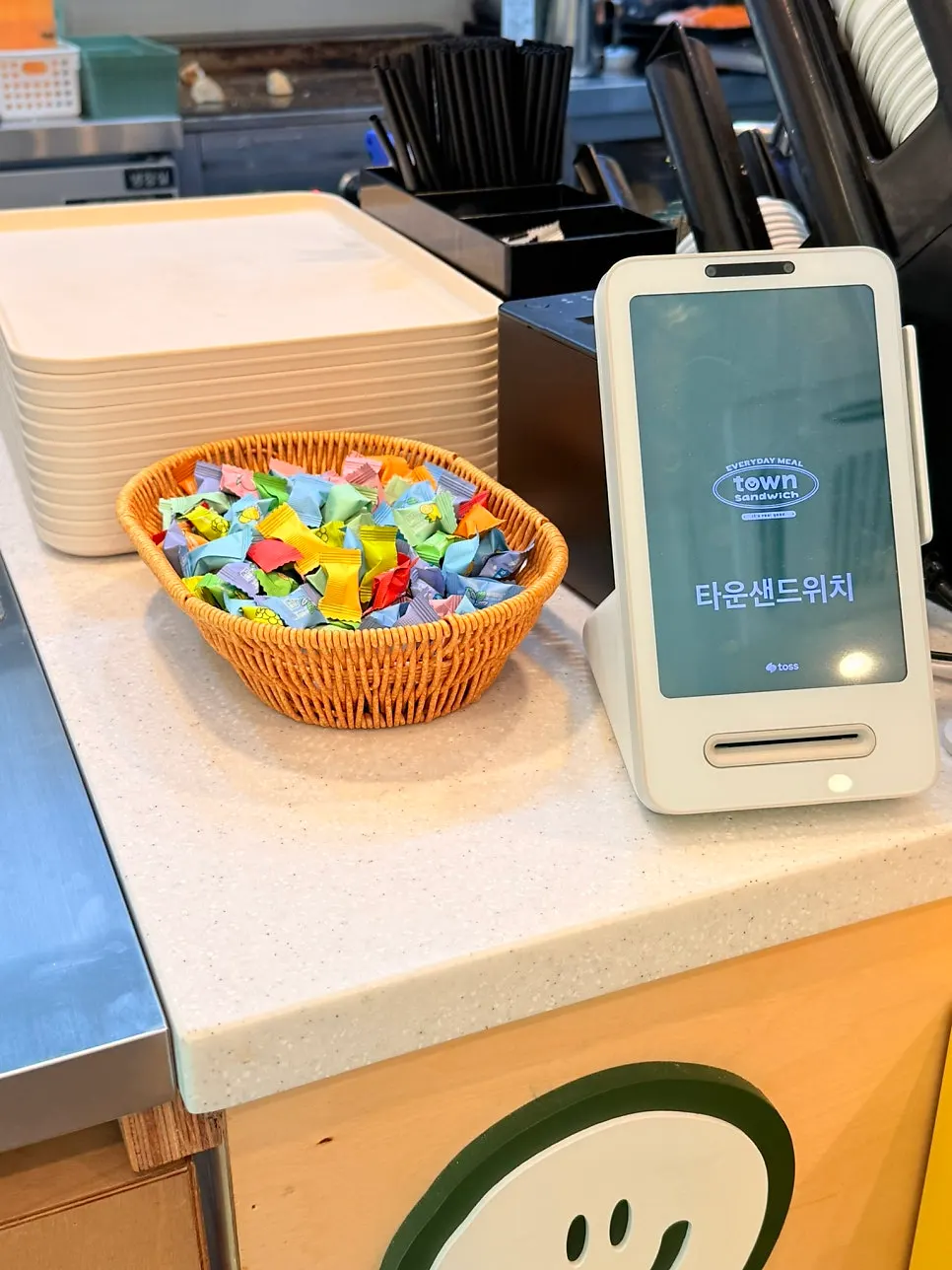 Store interior with an ordering area and open kitchen