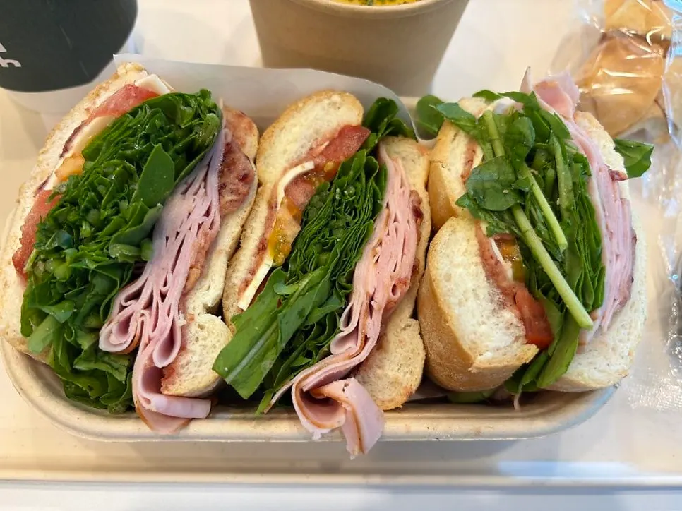 Plate with a baguette sandwich on the table