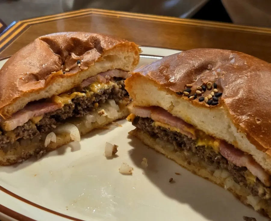 Cross-section of the bacon cheeseburger cut in half
