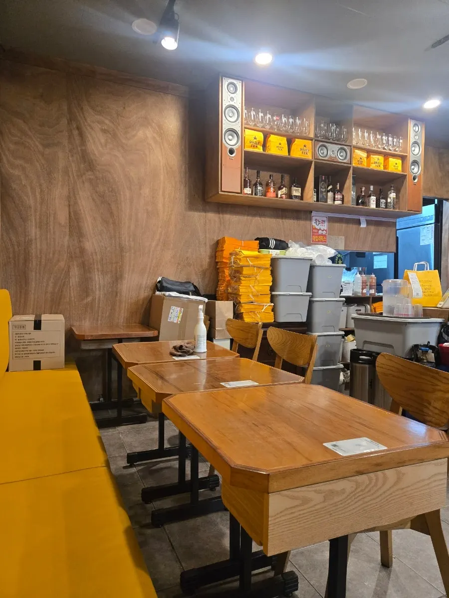 Seating area with 2-seat and 4-seat tables