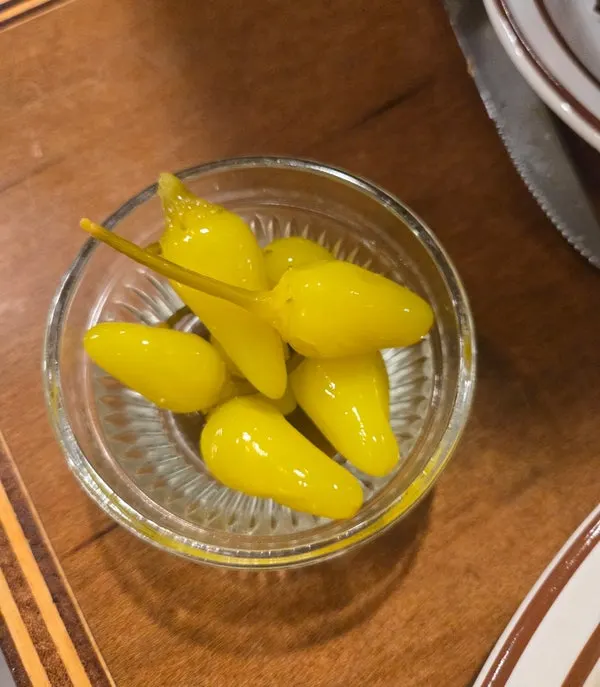 Jalapeños and dipping sauce brought over separately