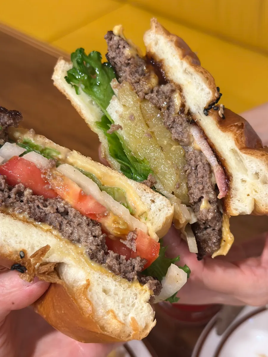 Cross-section of the juicy bacon cheeseburger