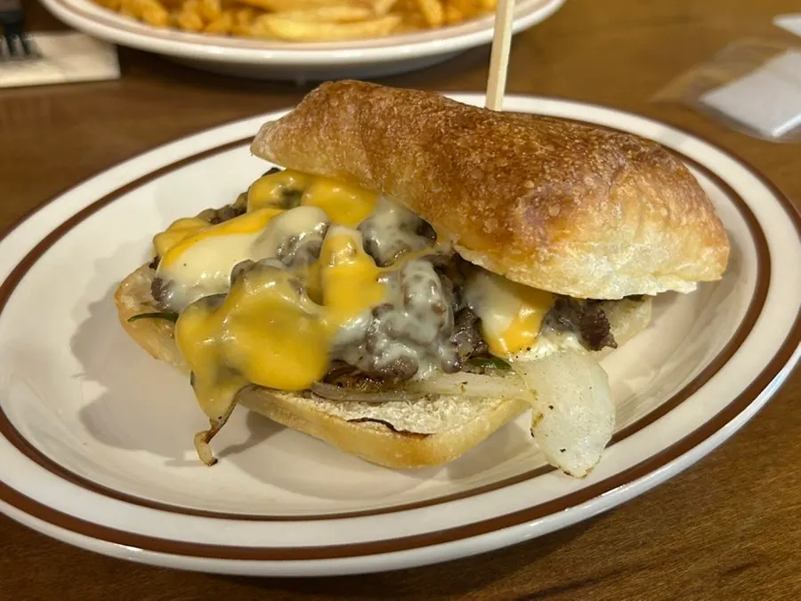 Classic burger cut in half with a knife