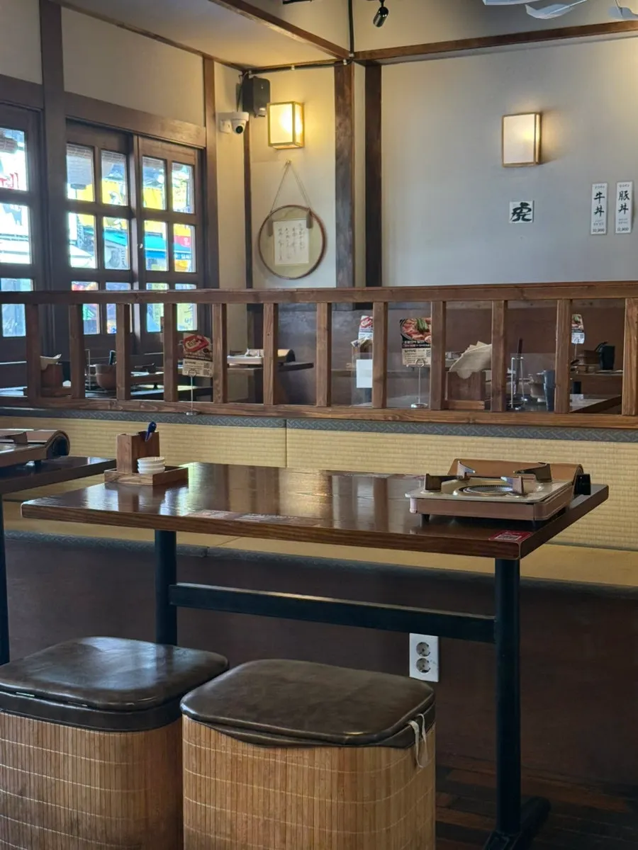 Interior of the restaurant with 4-person tables