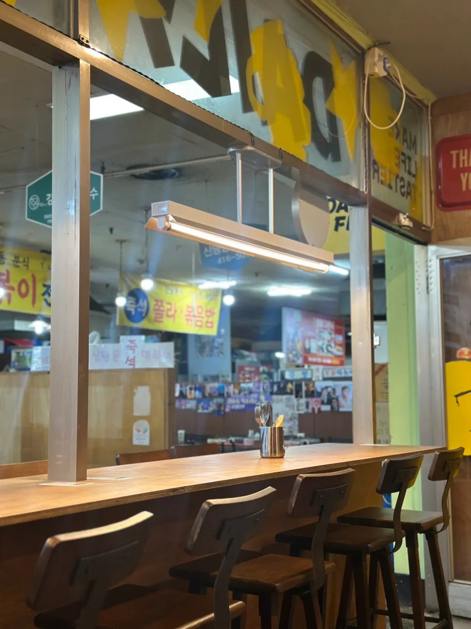 Diner space with lighting and decorative touches