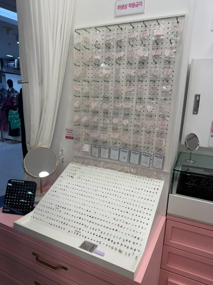 Store interior with piercing procedure information posted
