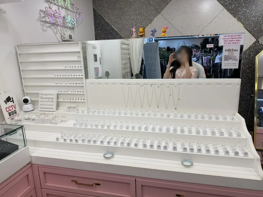 Assorted earrings in a display case