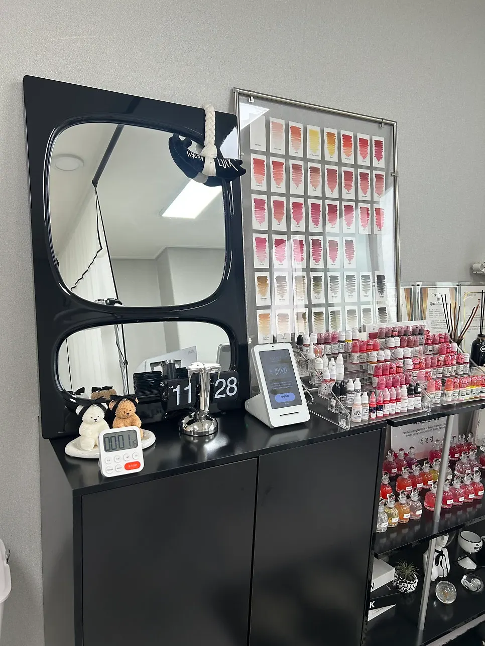 Lip color chart and interior view at Mood Moon Brow