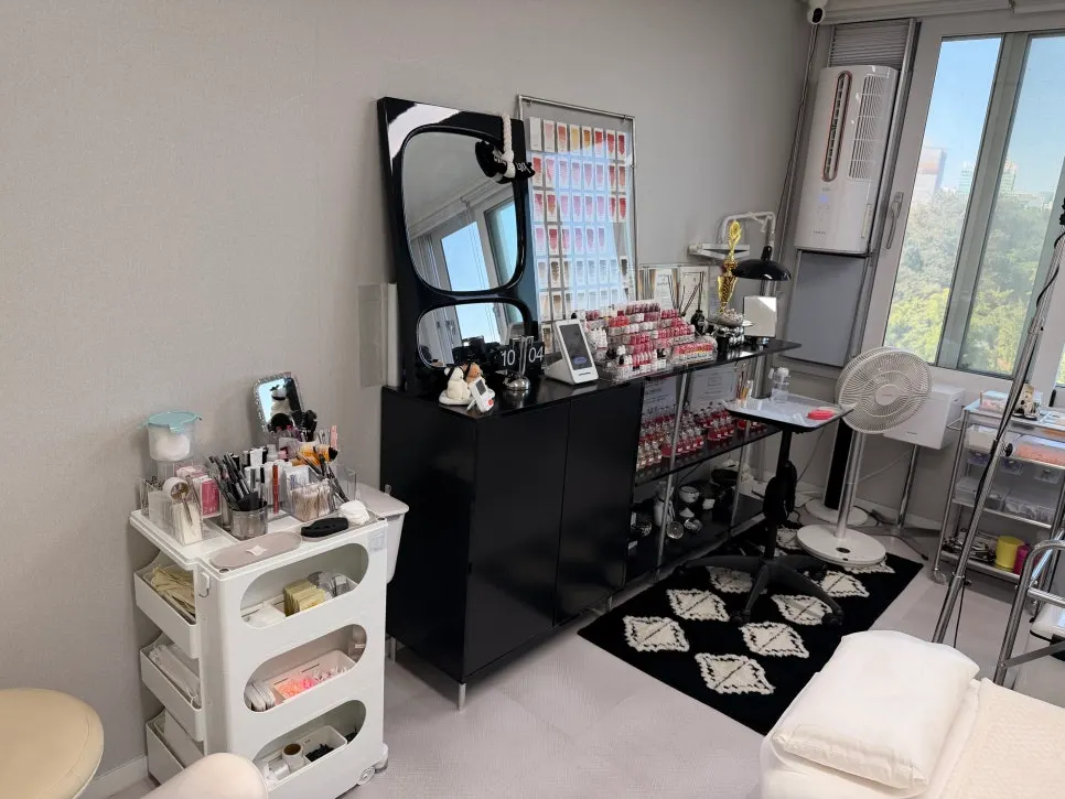 Interior of Mood Moon Brow, tidy in white tones