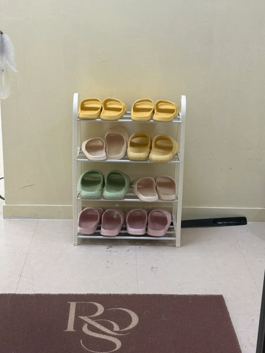 Slippers placed at the entrance of Rose Lash