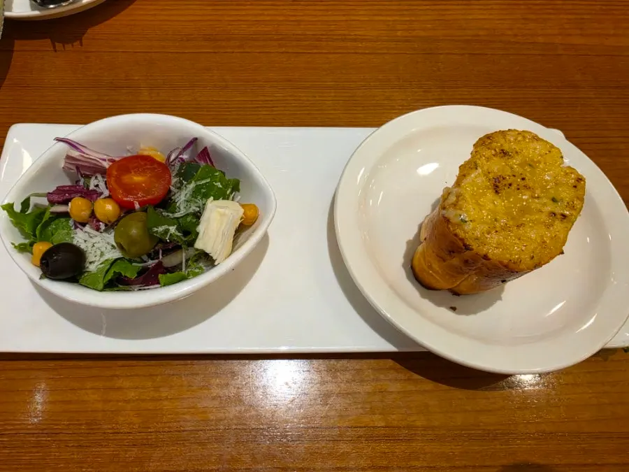 Interior of Mano di Chef Jamsil Branch with spaced-out tables