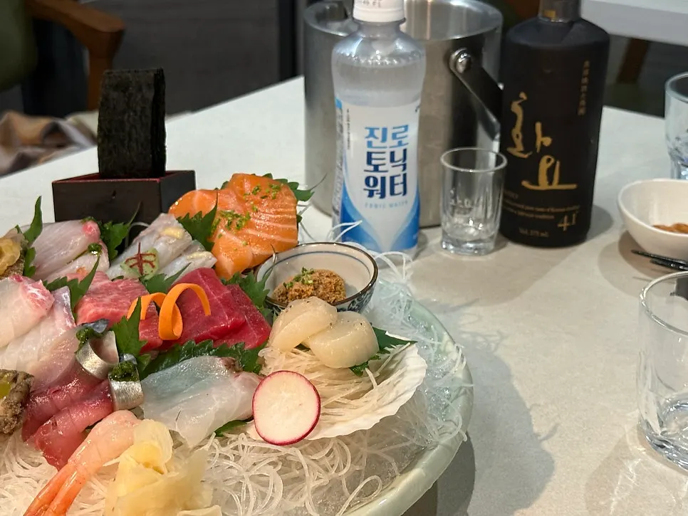 Sashimi plate and Hwayo bottle together on the table