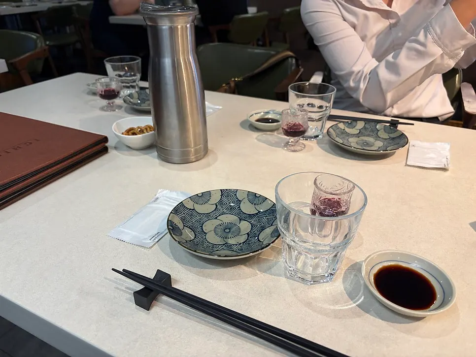 Full table view at Ichigo with drinks and side dishes