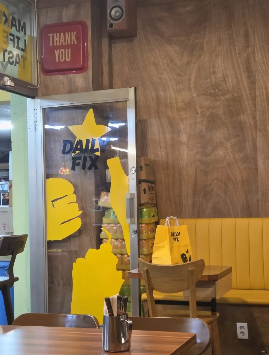 Takeout orders lined up on the counter at Daily Fix